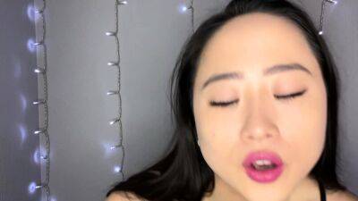 Shaved Asian milf squirting while masturbate on webcam - drtuber.com