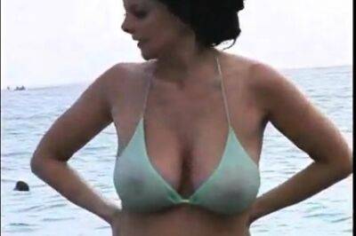 Hot MILF at beach in bikini - drtuber.com