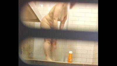 Chubby pussy farting MILF in a hostel shower - voyeurhit.com